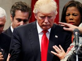 Trump praying before impeachment say a prayer
